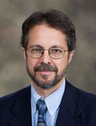 Dr. Charles Crecilius Dr. Charles Crecilius